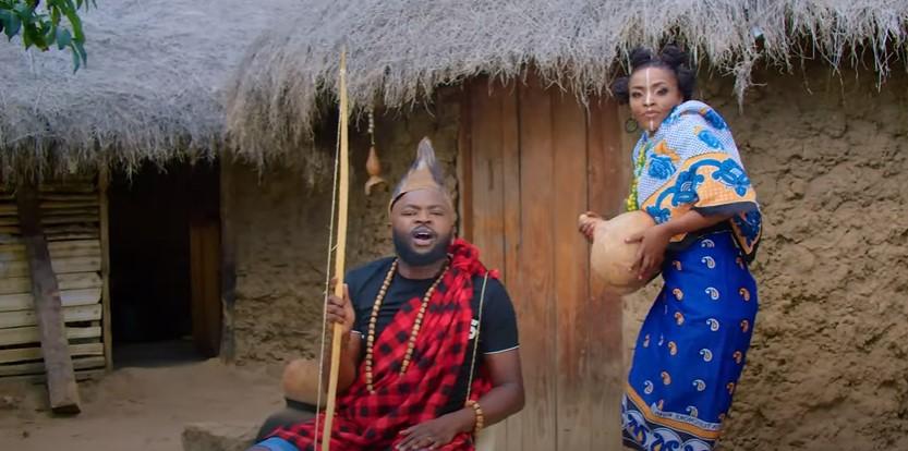 VIDEO: Ev John Kay - Mukamba Ft. Ashley kawinzi (Mp4 Download) - KibaBoy